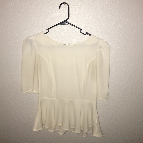 3/4 sleeved peplum top - Picture 1 of 1