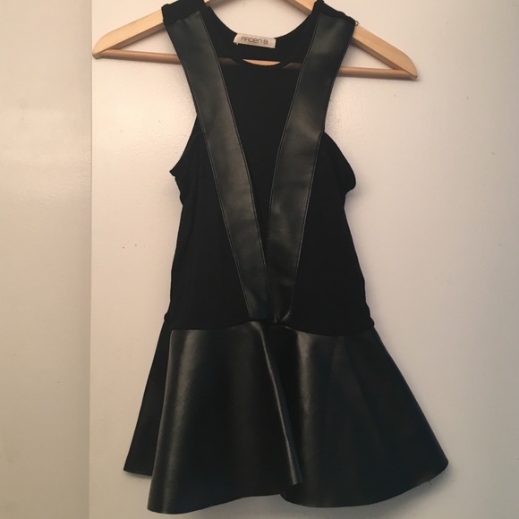 Sexy leather peplum top with mesh cleavage