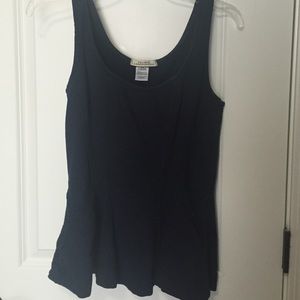 Flared pocketed tank