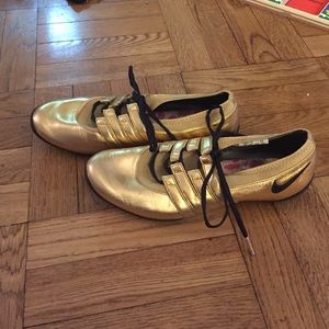 Gold limited edition Nike sneakers