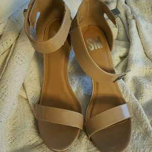 Women's nude high heels shoes.