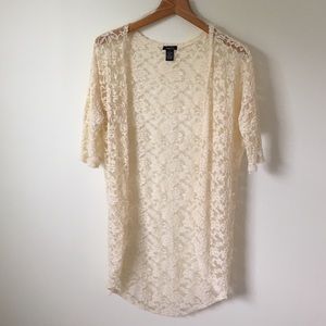 Cream tunic.