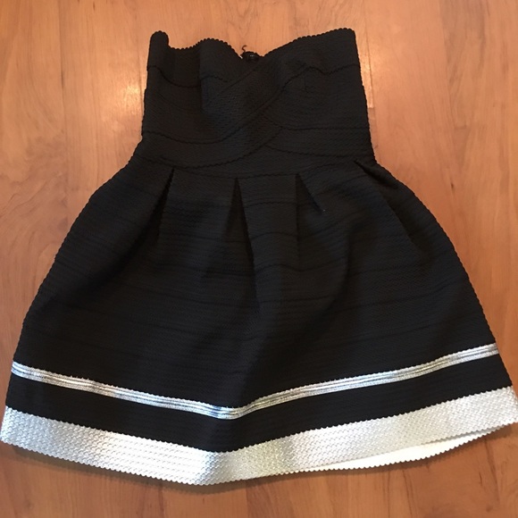 Black and silver strapless dress.