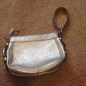 Silver leather Coach purse.