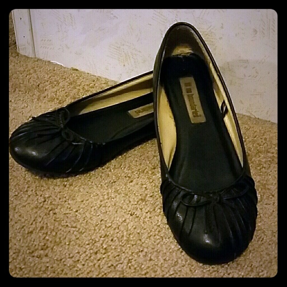 black flats with small bow on the toe