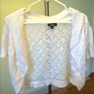 A simple and cute white shall/shrug