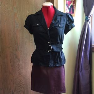 Black belted top with double breast pockets.