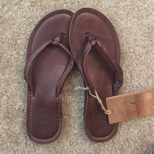 Brown flip flops