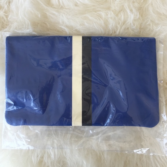Clare V. Foldover Clutch in ultramarine stripe. - Picture 2 of 3