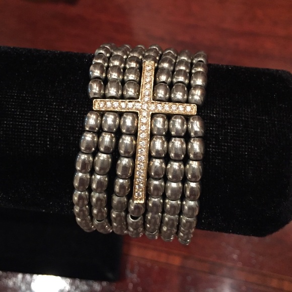 Wide bracelet with rhinestone cross