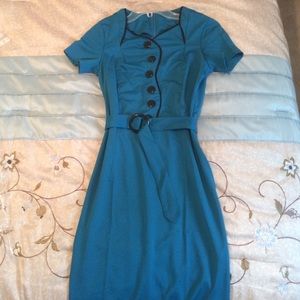 Form fitting turquoise green dress w belt.
