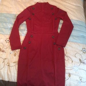 Form fitting claret red dress.