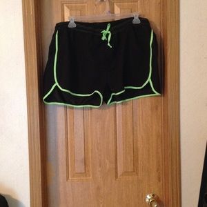 Black and lime green swim shorts