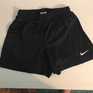black nike soccer shorts, size S