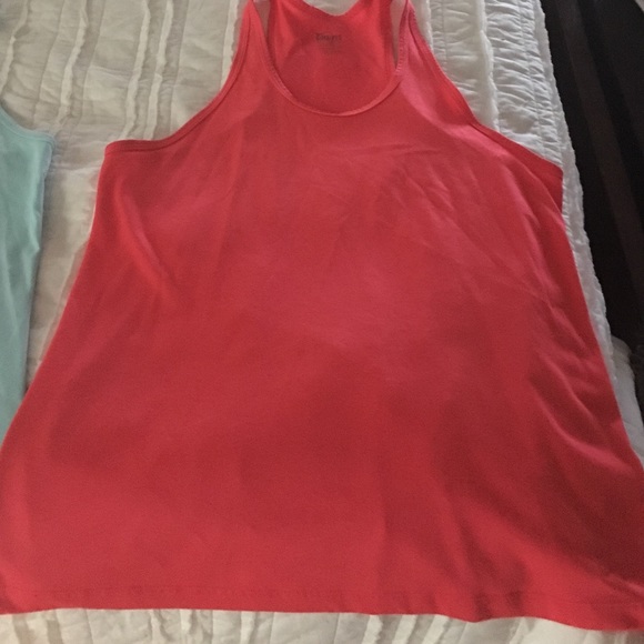 Two Nike workout shirts