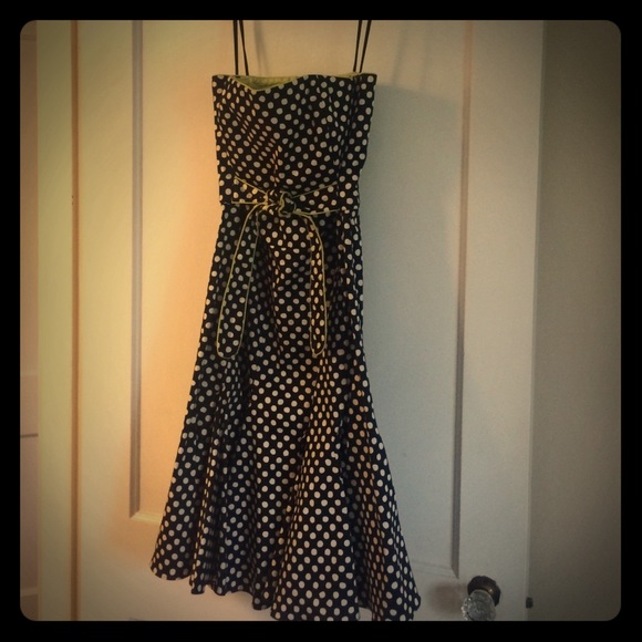 Strapless navy polka dress with lime accent