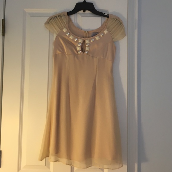 Beautiful cream dress with pearl beaded detail