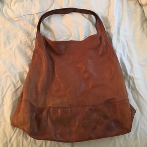 very loved real leather bag