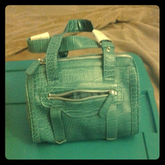 Green crocodile purse