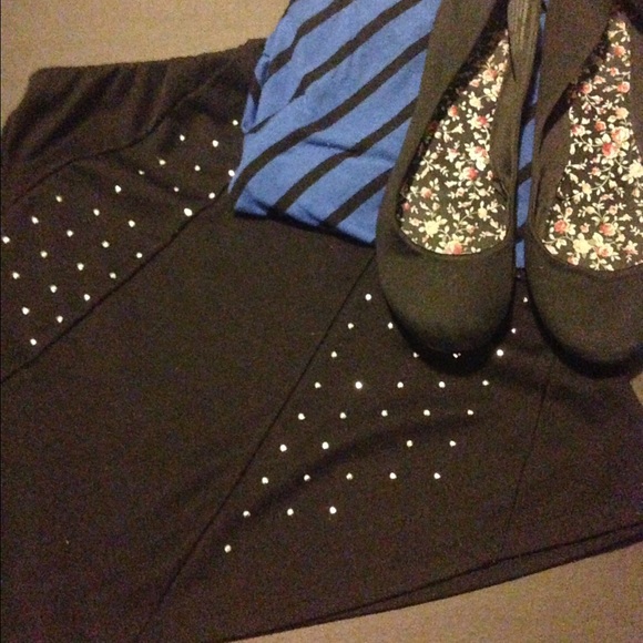 Black skirt with gems on the front.