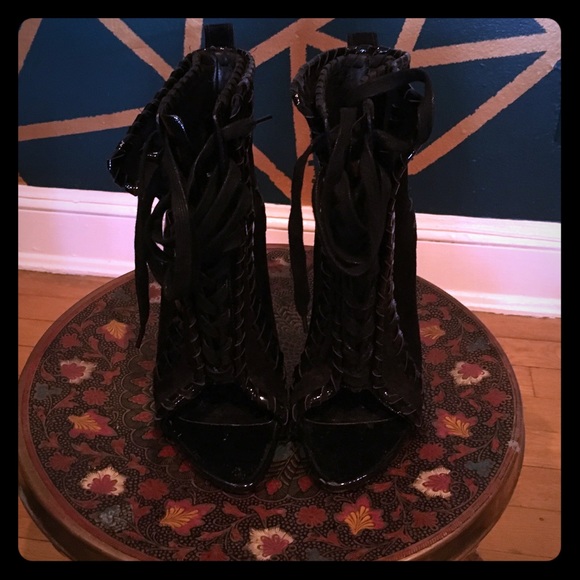 Black Whip stitch Wang peep toe booties.