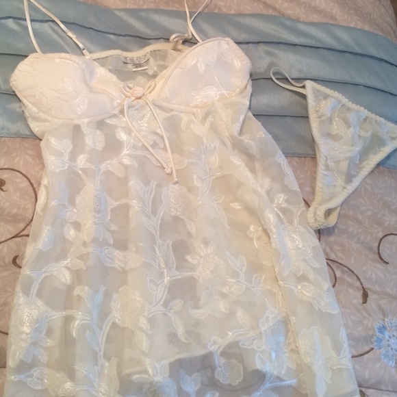 Cream lace chemise/teddy w matching thong panty.