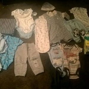 Baby cloths shoes bibs and diapers