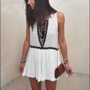 LF White Romper with Black Embellishment
