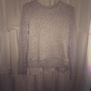 Fuzzy thick light blue sparkly sweater.