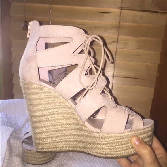 Nude velvet wedges.