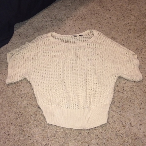 Never worn 4-season sweater