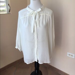Gorgeous & sexy sheer blouse. Color: off white