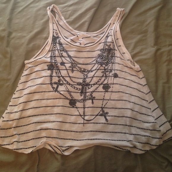 Cute white and black stripped split back shirt!