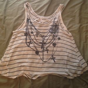 Cute white and black stripped split back shirt!