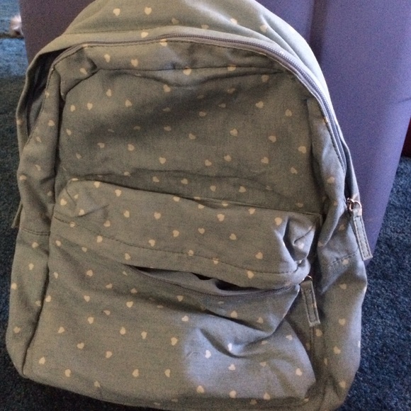 Light blue and with white hearts. Never used.