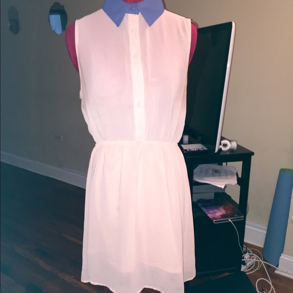 Button up collared dress with open back.