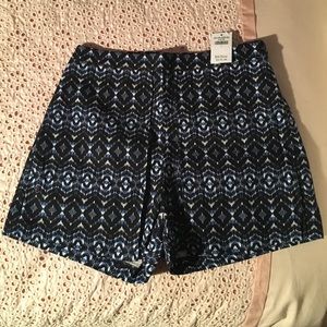 Patterned pleated high-rise shorts