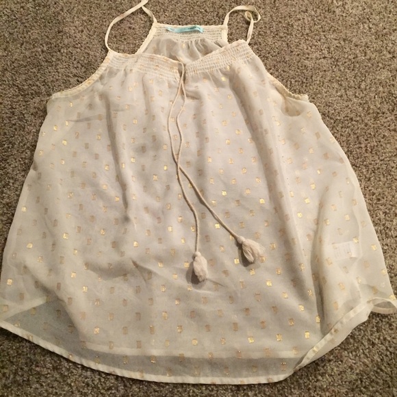 Off-white and gold free-flowing tank