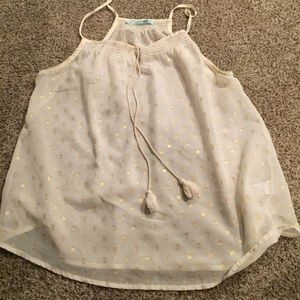 Off-white and gold free-flowing tank