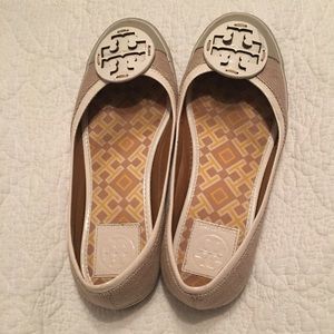 Slide on Tory Burch flats.