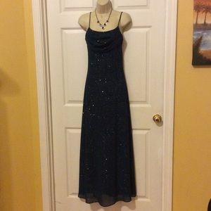 Elegant dark green formal dress with sparkle