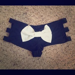 Black rave booty shorts