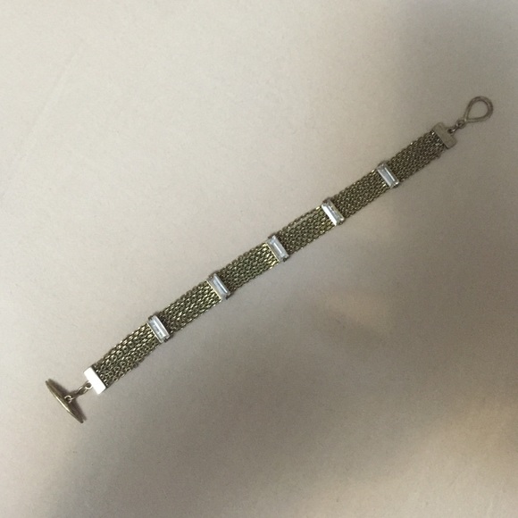 Antique gold tone chain and rhinestone bracelet.