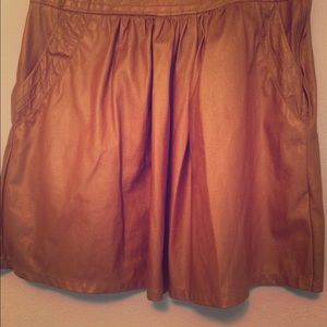 Faux leather mini skirt with pockets Faux leather mini skirt with pockets