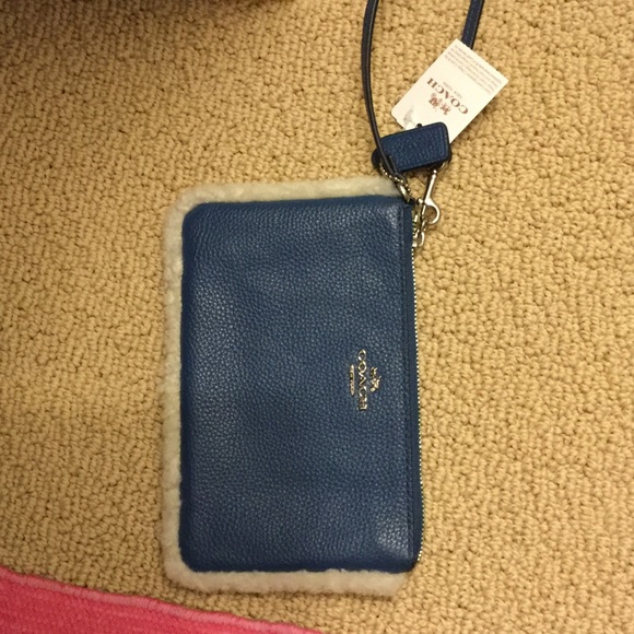 Brand new Coach wristlet