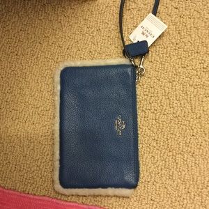 Brand new Coach wristlet