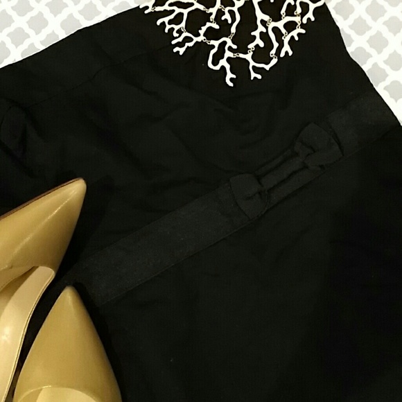 Strapless black dress with bow