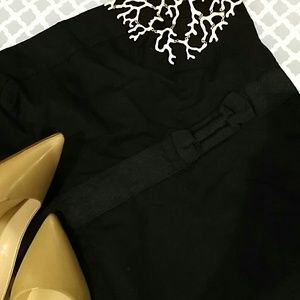 Strapless black dress with bow