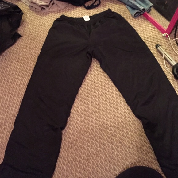 Varsity cheerleading track pants.