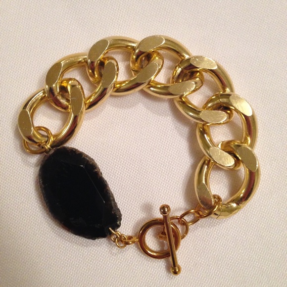 Gold chunky chain bracelet with black stone